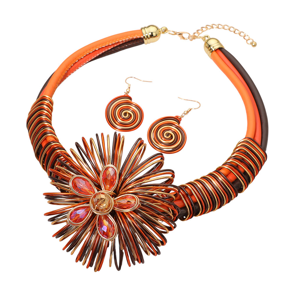 ORANGE, BROWN METAL SWIRL COIL DESIGN