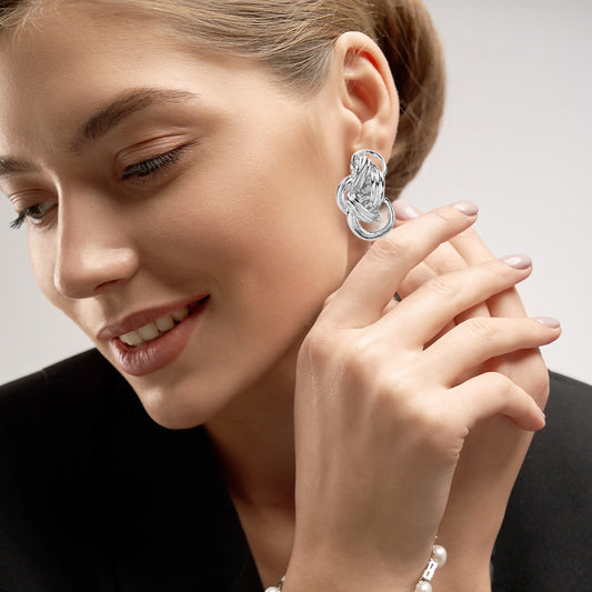 CLIP ON SILVER KNOT EARRINGS